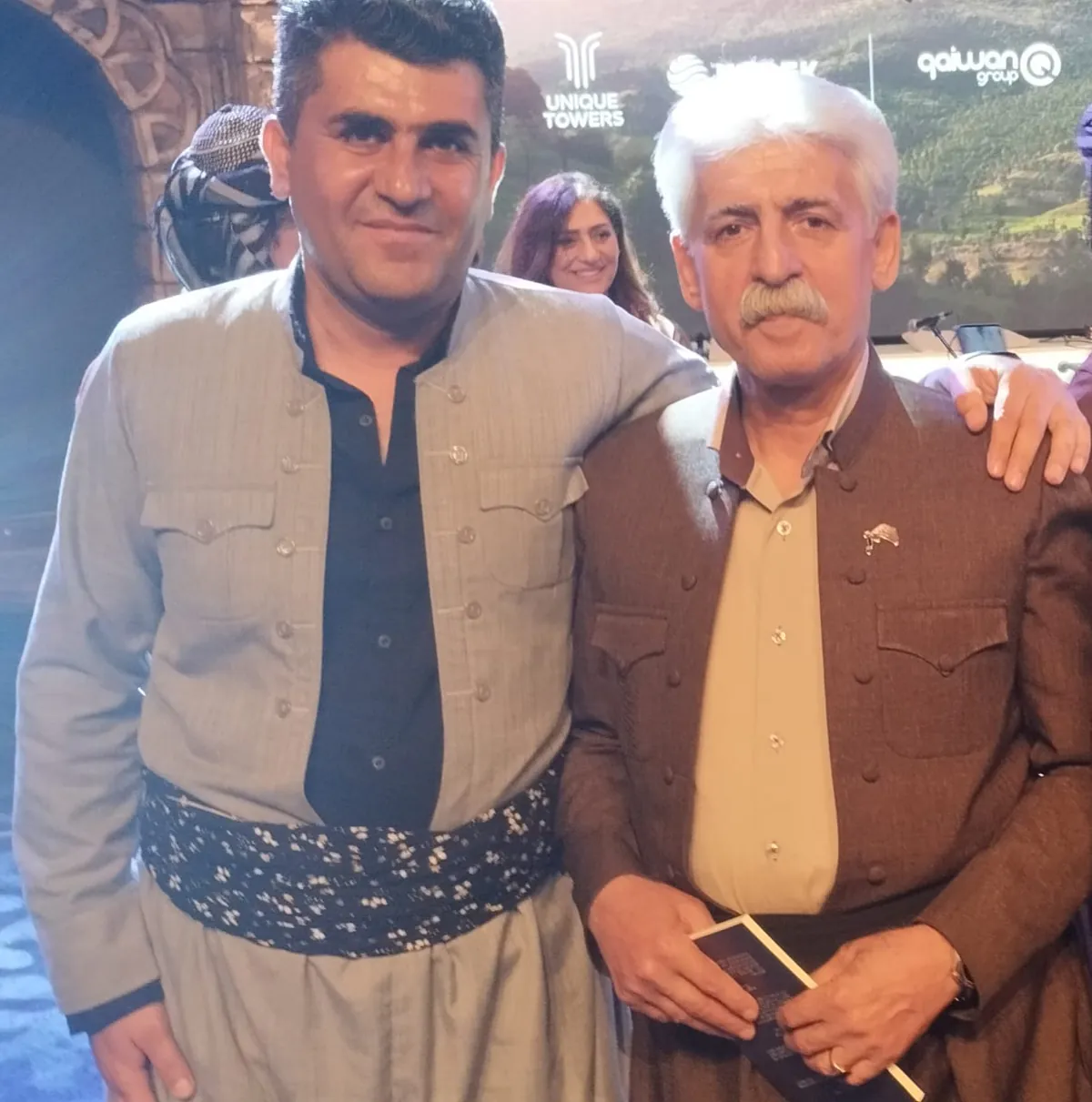 Arash Sohrabi with a fellow artist after a performance.